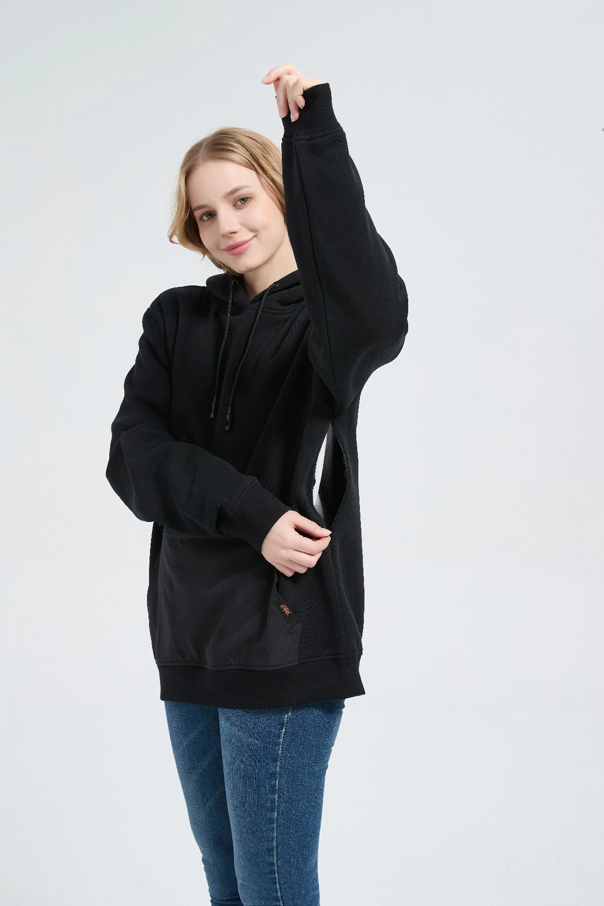 Functional hidden pockets for passport and phone storage on the Relexit travel hoodie for smarter travel