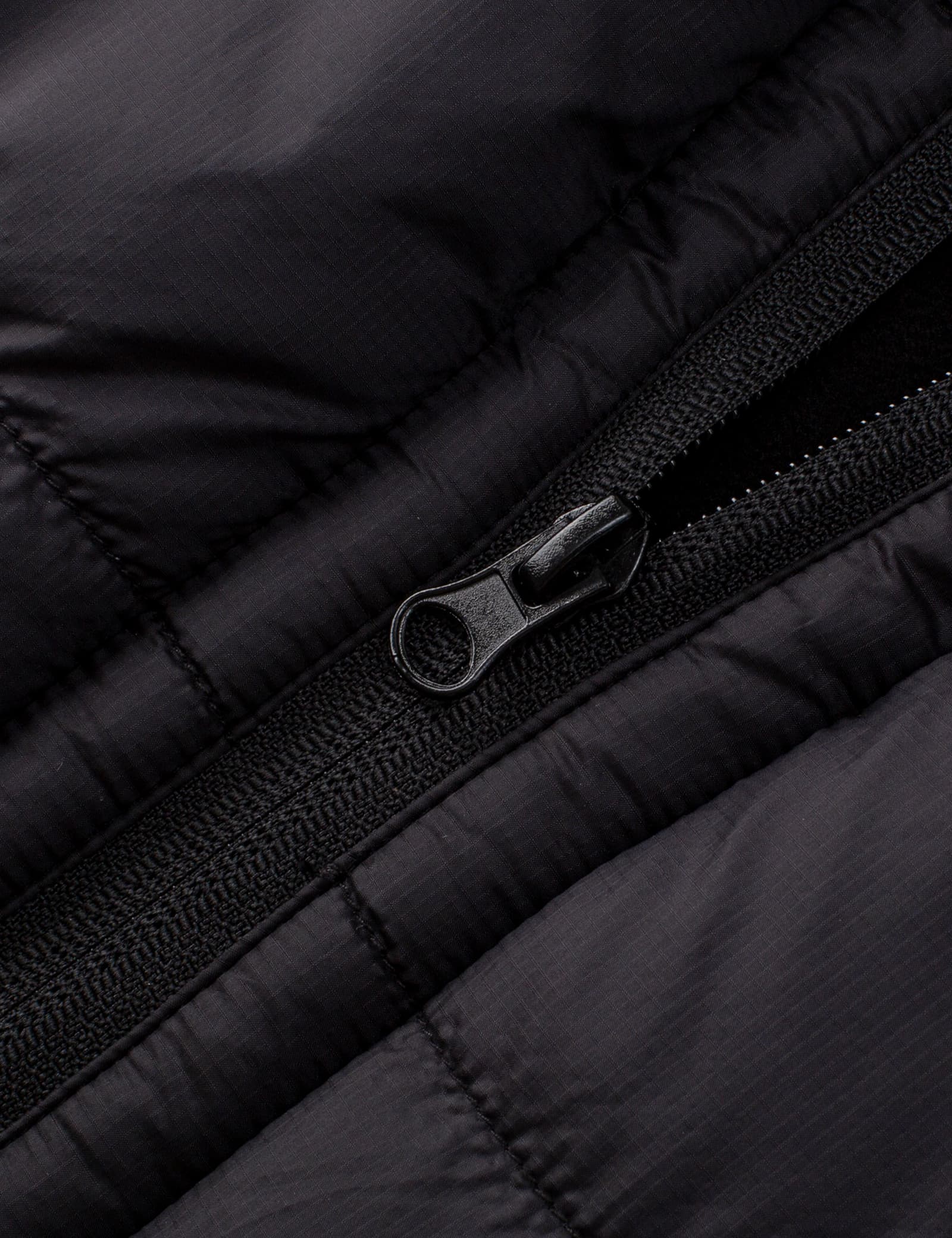 women's black 12V heated poncho durable zipper close up