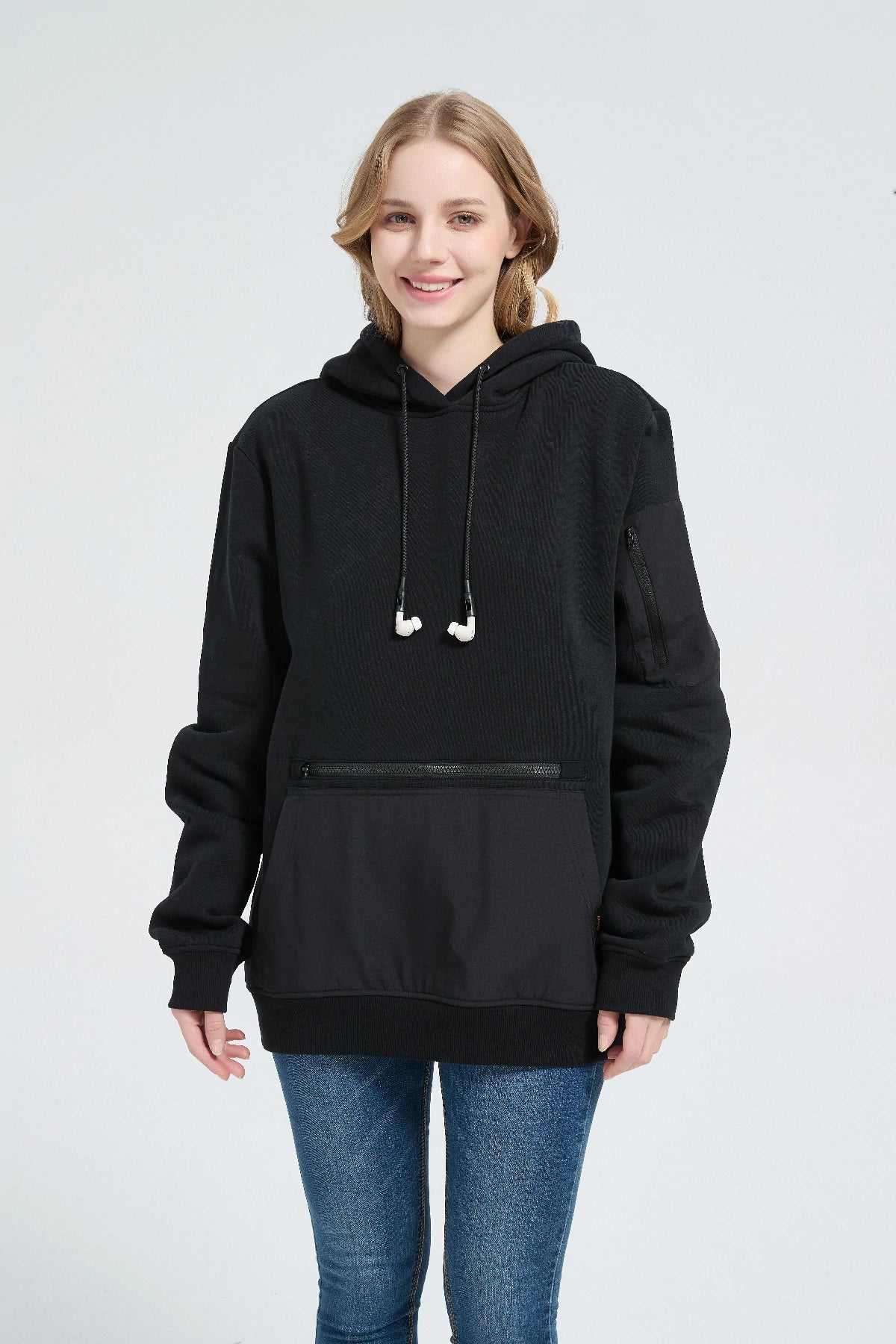Secure earbud storage and built-in clasps on the Relexit comfort travel hoodie to prevent loss